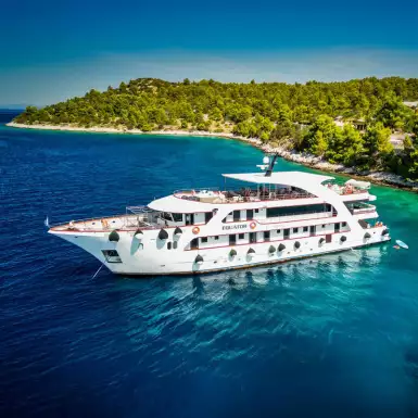 image of the new MS Equator yacht in the blue turquoise waters of a bay in croatia
